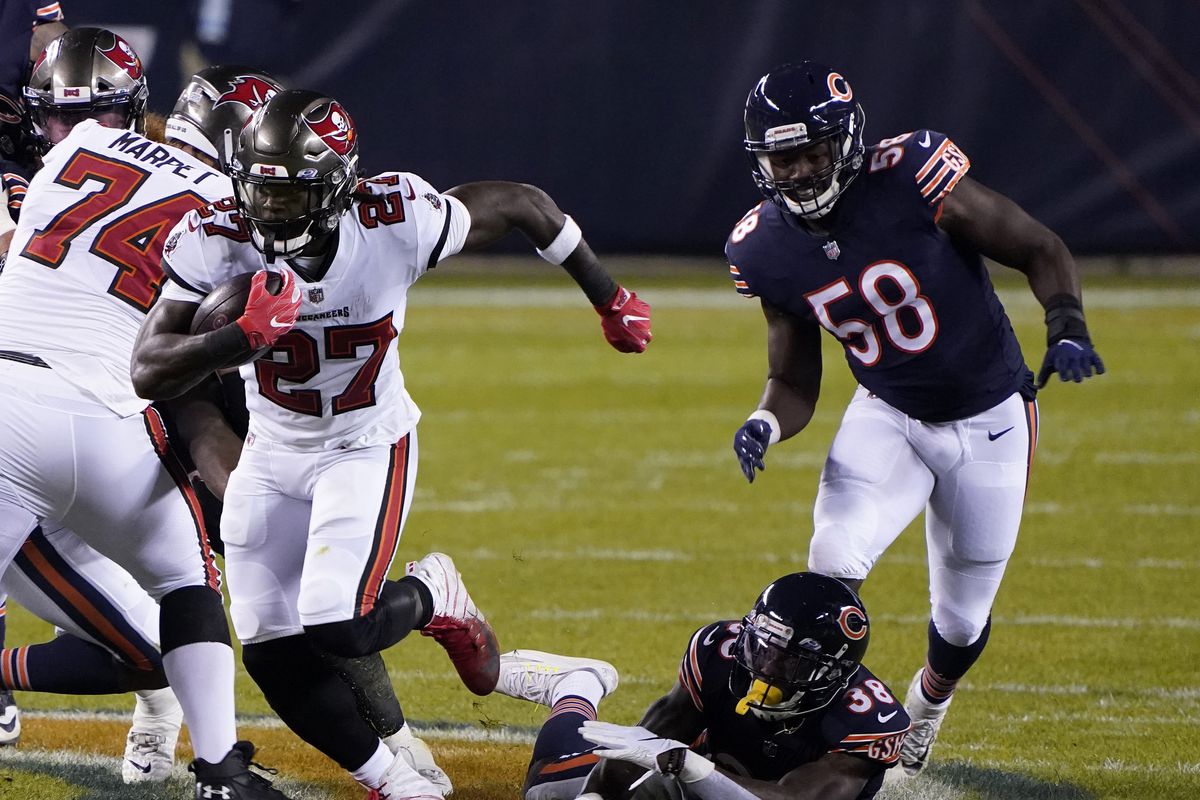 Tampa Bay Buccaneers running back Ronald Jones (27) rushes the ball against the Chicago Bears during the first quarter at Soldier Field.&nbsp;