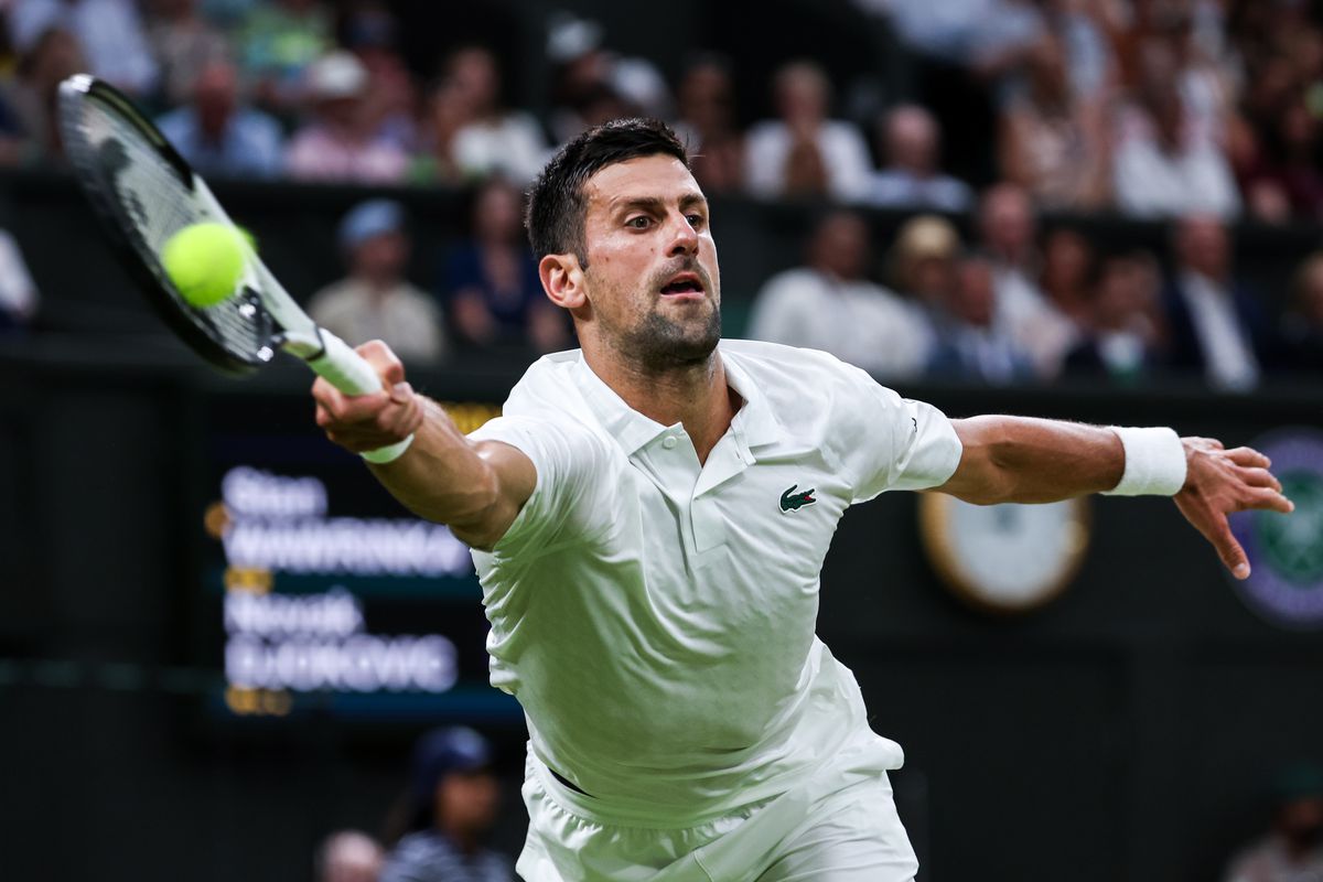 Novak Djokovic of Serbia plays a forehand in the Men’s Singles third round match against Stan Wawrinka of Switzerland during day five of The Championships Wimbledon 2023 at All England Lawn Tennis and Croquet Club on July 07, 2023 in London, England.