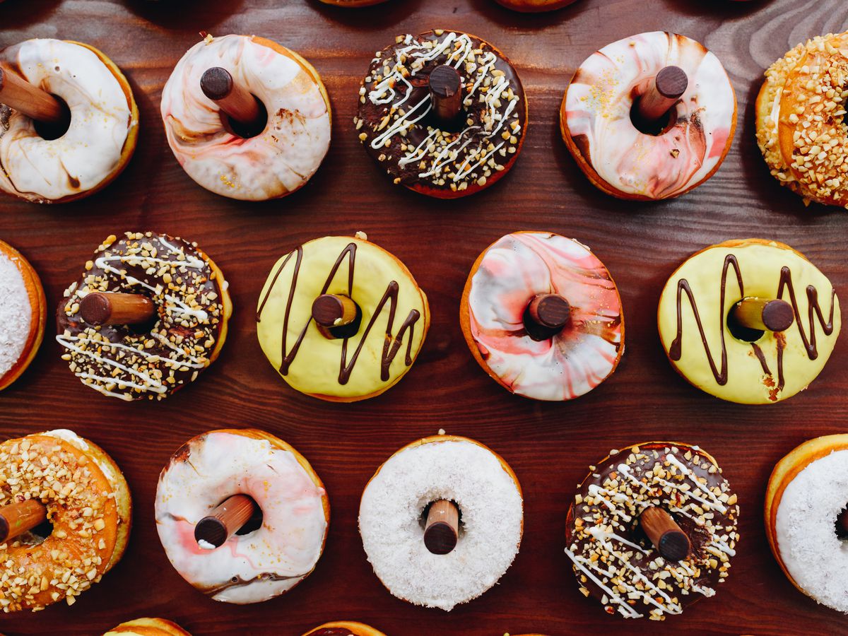 a bunch of doughnuts on a table.