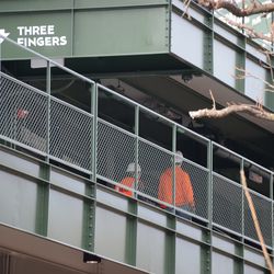Workers spotted in the right-field bleachers -