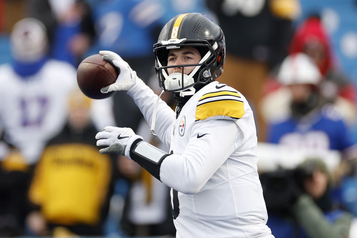 Kenny Pickett #8 of the Pittsburgh Steelers warms up before the game against the Buffalo Bills at Highmark Stadium on January 15, 2024 in Orchard Park, New York.