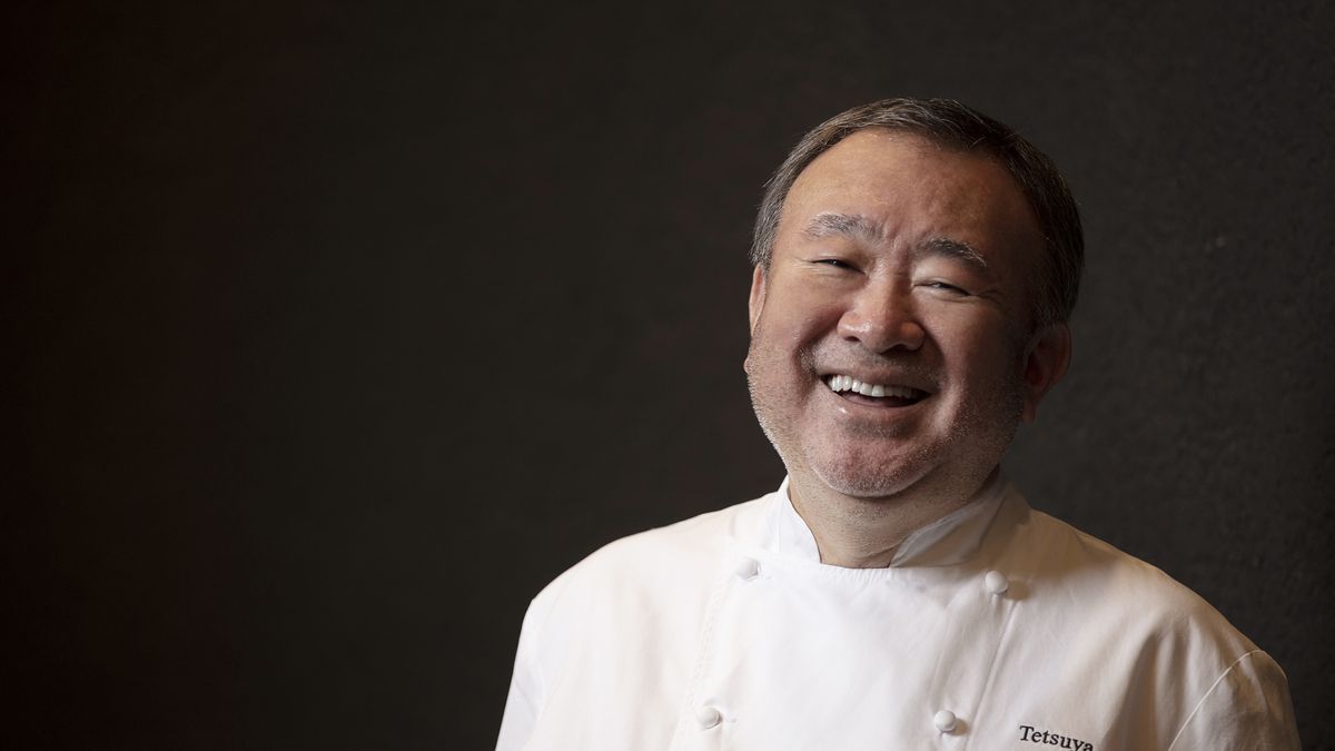 A Japanese man in a white chef’s coat