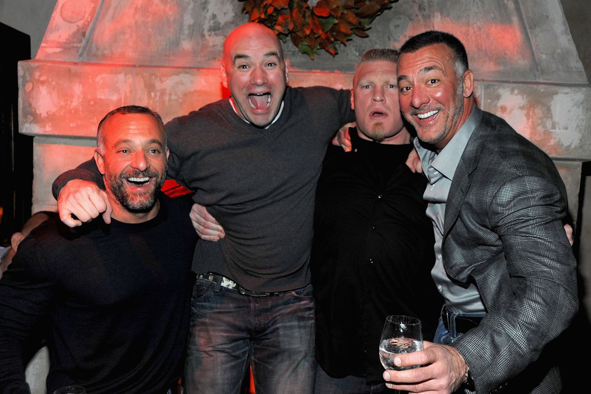 Dana White at the UFC 211 party with former owners Lorenzo and Frank Fertitta, and ex-champion Brock Lesnar.