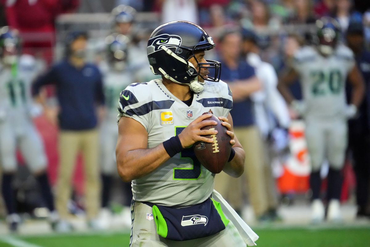 Seattle Seahawks quarterback Russell Wilson (3) drops back to pass against the Arizona Cardinals during the second half at State Farm Stadium.