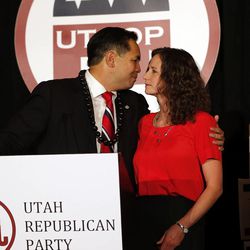 Utah Attorney General Sean Reyes hugs his wife, Saysha, as he declares victory in the Attorney General race on election night in Salt Lake City, Tuesday, Nov. 4, 2014.