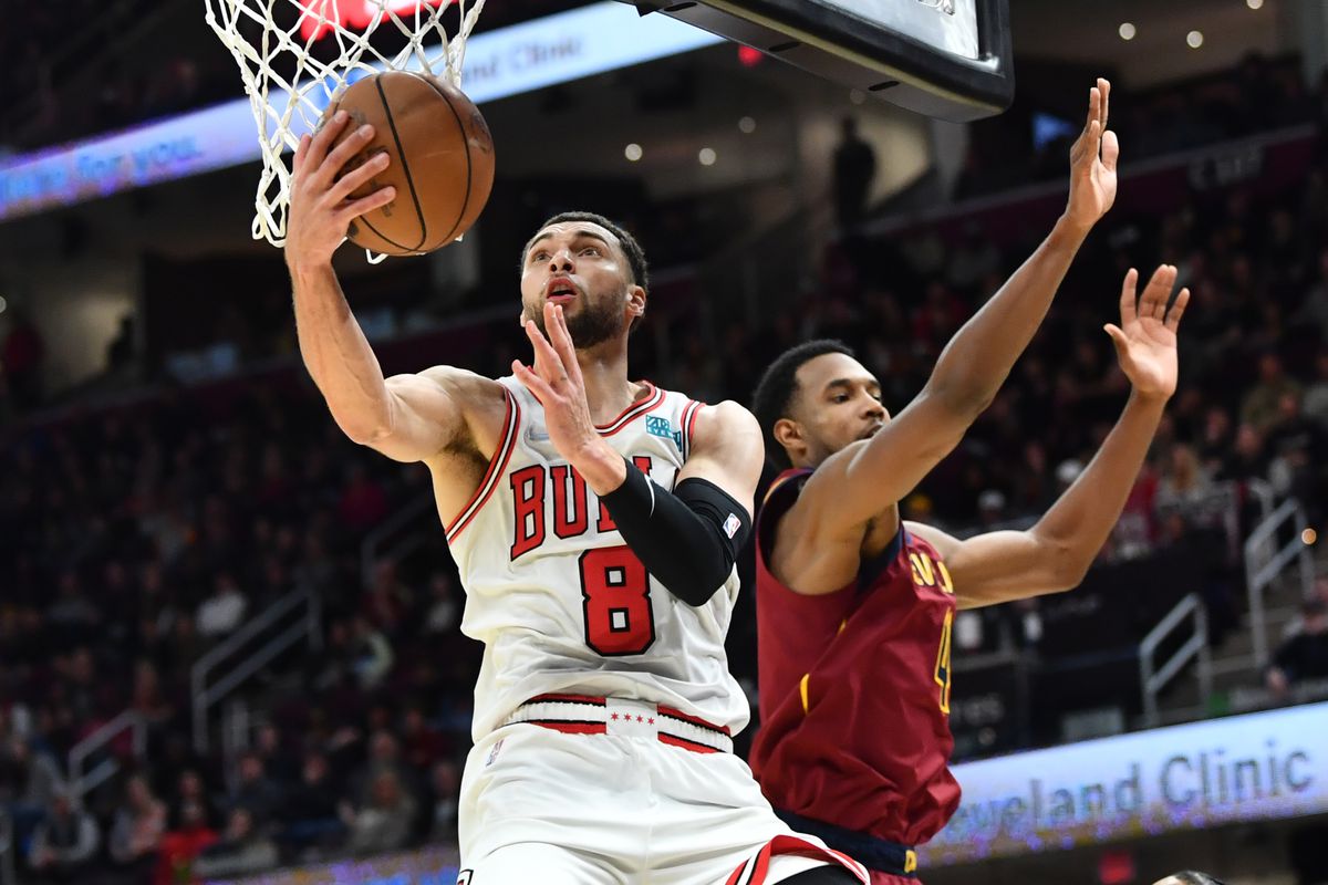 Chicago Bulls guard Zach LaVine (8) drives to the basket against Cleveland Cavaliers center Evan Mobley (4) during the second half at Rocket Mortgage FieldHouse.