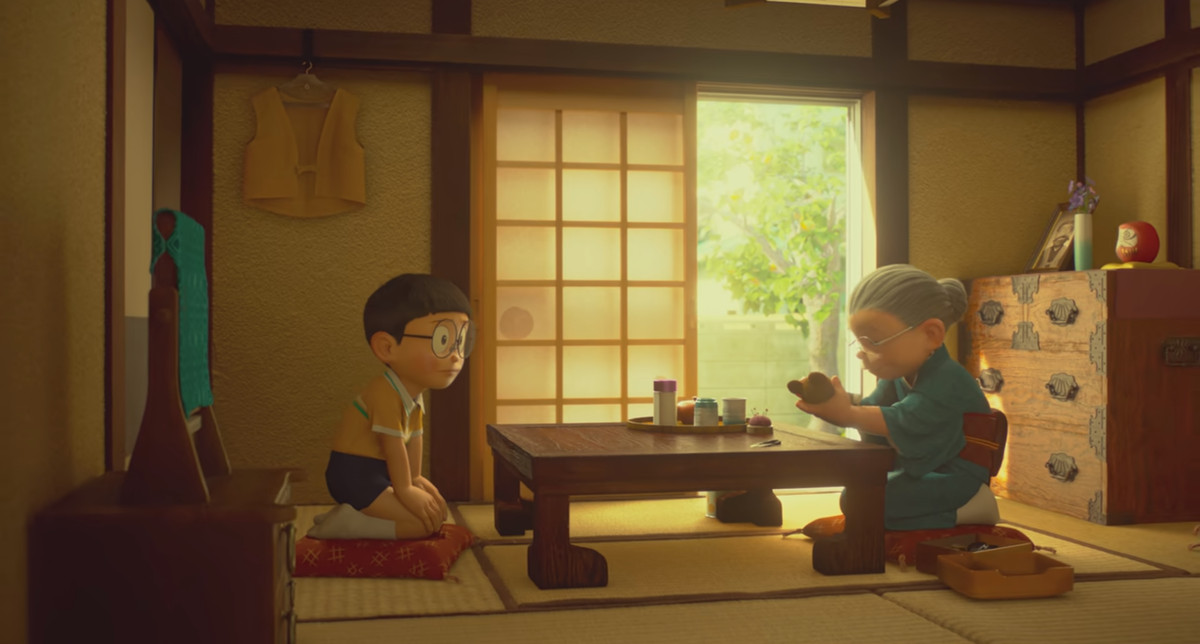Nobita and his grandmother kneel at a table in Stand by Me Doraemon 2.