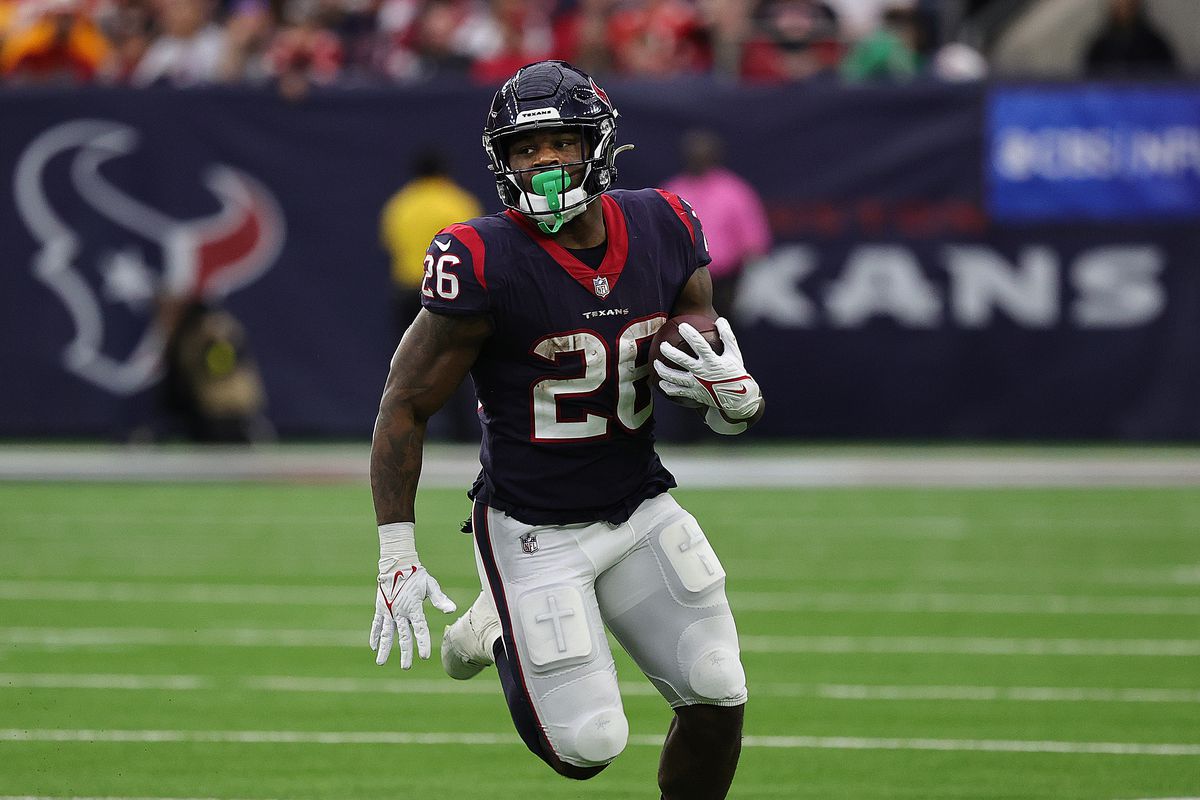 HOUSTON, TEXAS - DECEMBER 18: Royce Freeman #26 of the Houston Texans runs with the ball during the second half against the Kansas City Chiefs at NRG Stadium on December 18, 2022 in Houston, Texas.