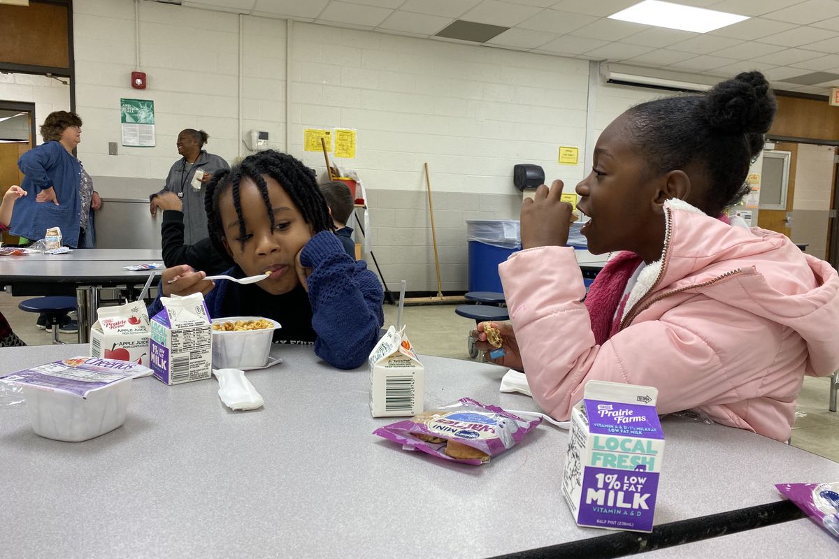 Students eat breakfast at AYS' child care program at School 27 while Indianapolis Public Schools closed for teachers to attend the statehouse Red for Ed rally on Tuesday, Nov. 19, 2019.