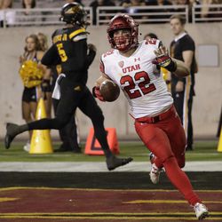 Utah defensive back Chase Hansen (22) scores a touchdown after an interception against Arizona State during the second half of an NCAA college football game, Thursday, Nov. 10, 2016, in Tempe, Ariz. (AP Photo/Matt York)