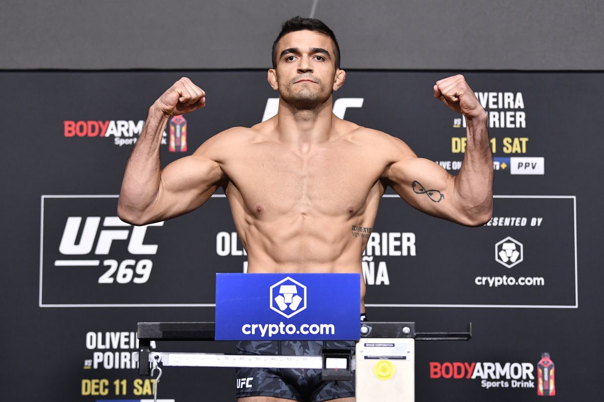 Andre Muniz of Brazil poses on the scale during the UFC 269 official weigh-in at UFC APEX on December 10, 2021 in Las Vegas, Nevada.
