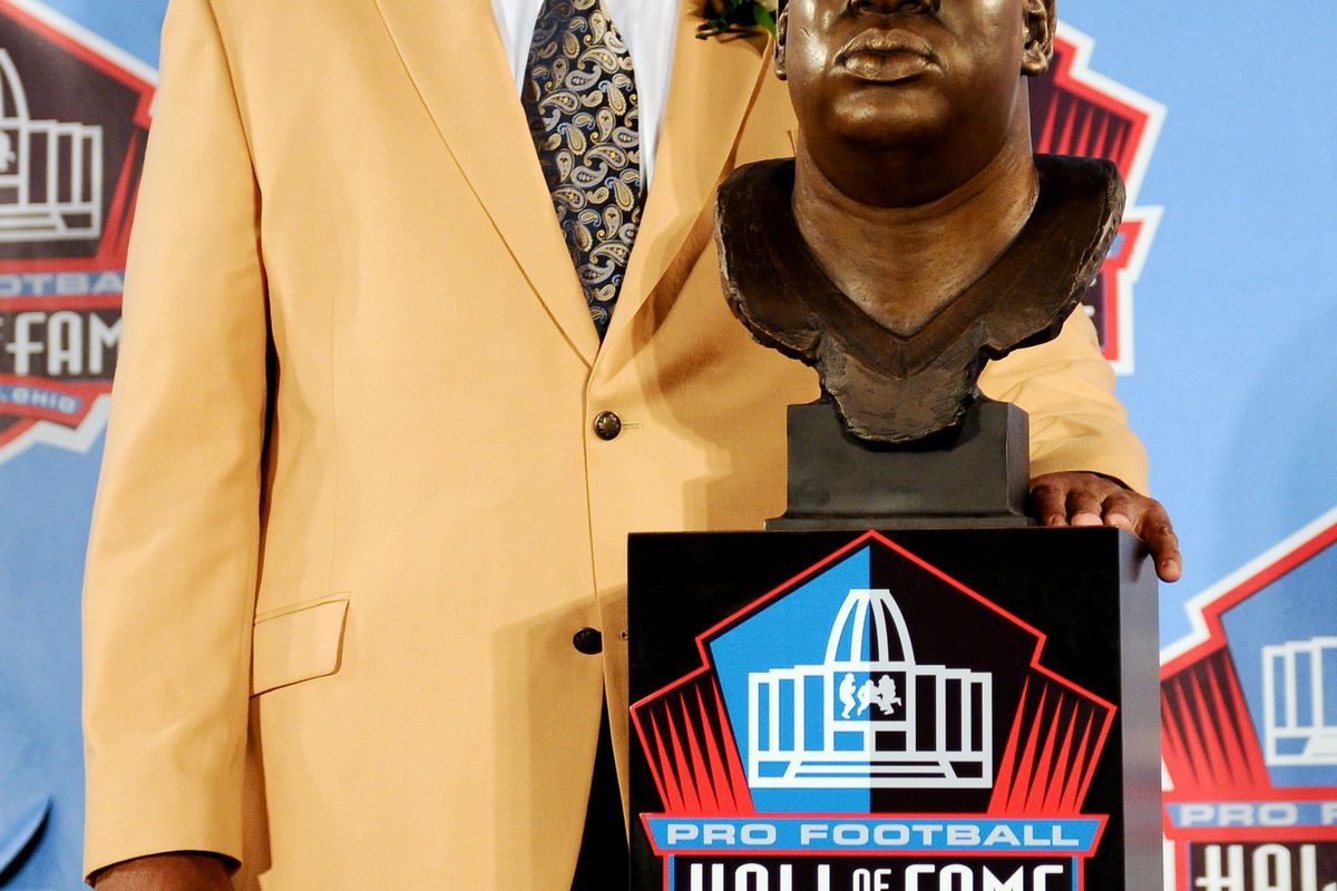 Aug 4, 2012; Canton, OH, USA; Cortez Kennedy poses with his bust at the 2012 Pro Football Hall of Fame Enshrinement at Fawcett Stadium. Mandatory Credit: Tim Fuller-US PRESSWIRE