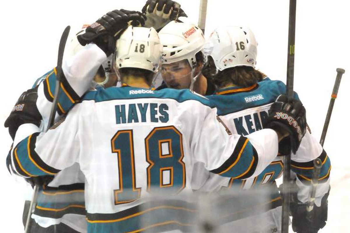 The Worcester Sharks celebrate one of Bracken Kearns' two first period power play goals Sunday evening at the DCU Center.