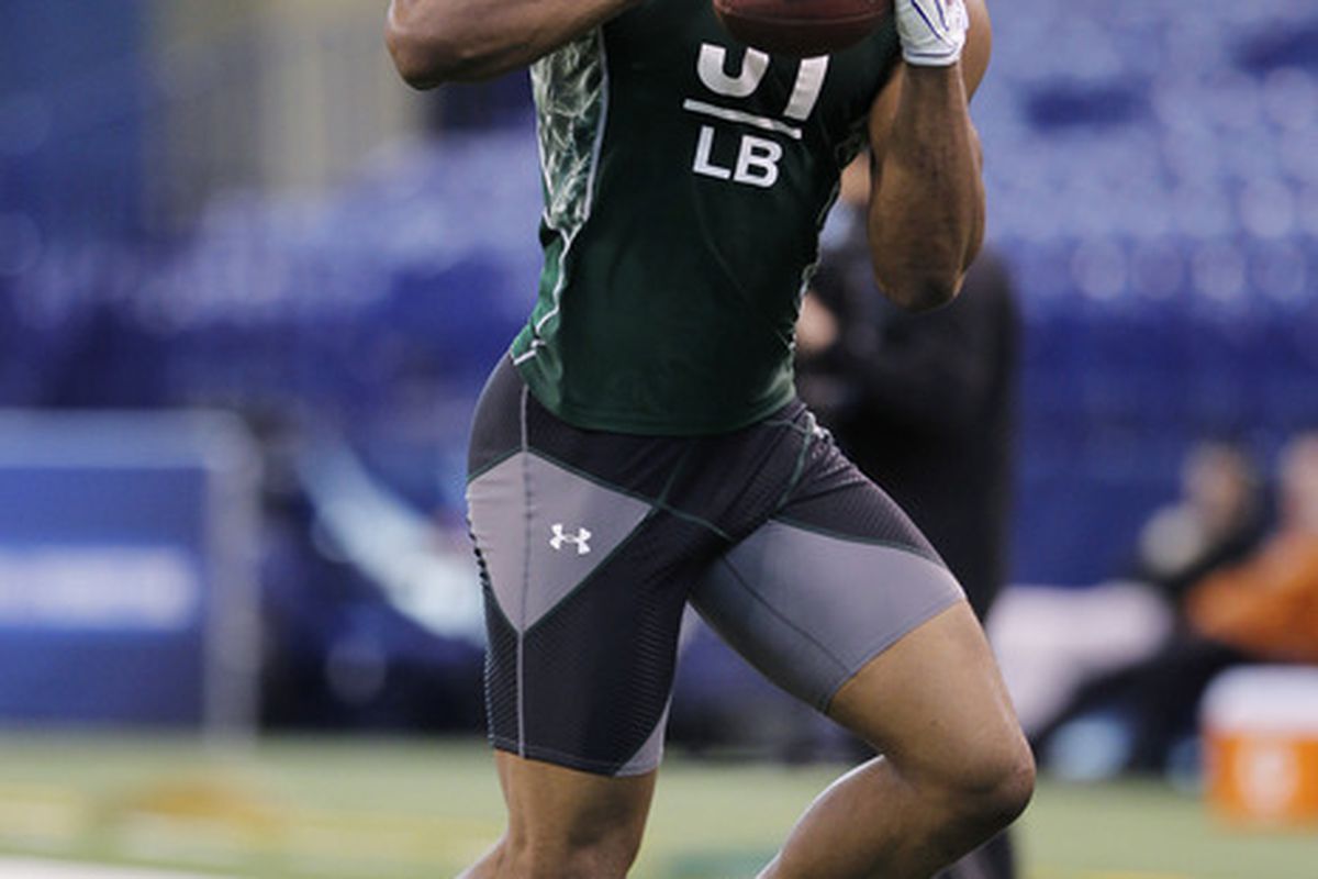 INDIANAPOLIS, IN - FEBRUARY 28: Martez Wilson of Illinois works out during the 2011 NFL Scouting Combine at Lucas Oil Stadium on February 28, 2011 in Indianapolis, Indiana. (Photo by Joe Robbins/Getty Images)