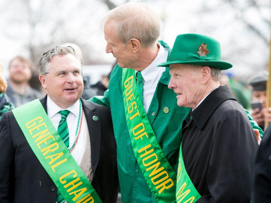Gov. Bruce Rauner, center, talks to St. Patrick’s Day Parade Chairman Jim Coyne, left, and state House Speaker Mike Madigan, right, at the Chicago St. Patrick’s Day parade, Saturday, March 12, 2016. File Photo. James Foster / For Sun-Times Media