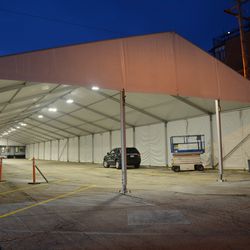 7:36 p.m. VIP/Players parking lot tent - 