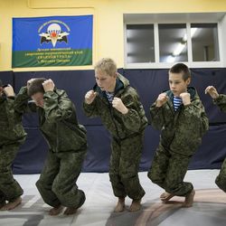 In this photo taken on Friday, Oct. 28, 2016, Russian children attend a training in parachute techniques in Verkhnyaya Pyshma, just outside Yekaterinburg, Russia. The training has been run by Yunarmia (Young Army), an organization sponsored by the Russian military that aims to encourage patriotism among the Russian youth. 