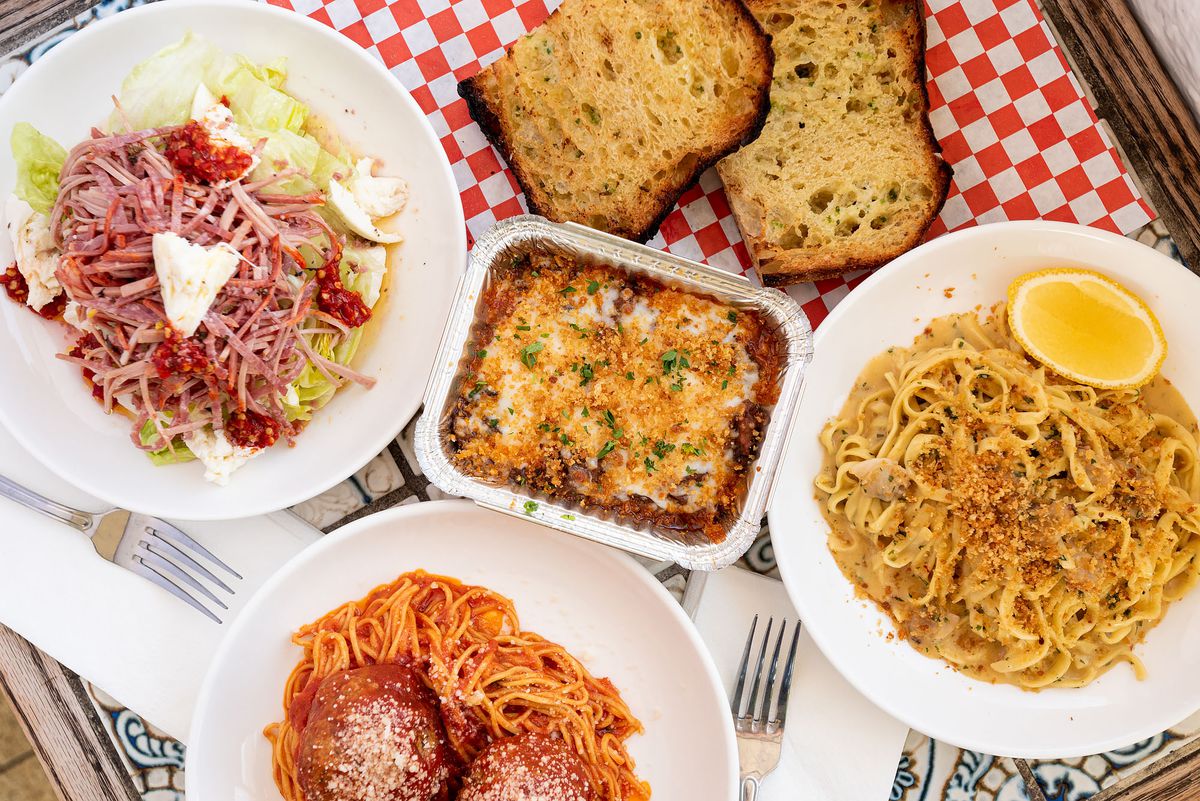 Dishes from Sunday Gravy in Inglewood, California, including spaghetti and meatballs