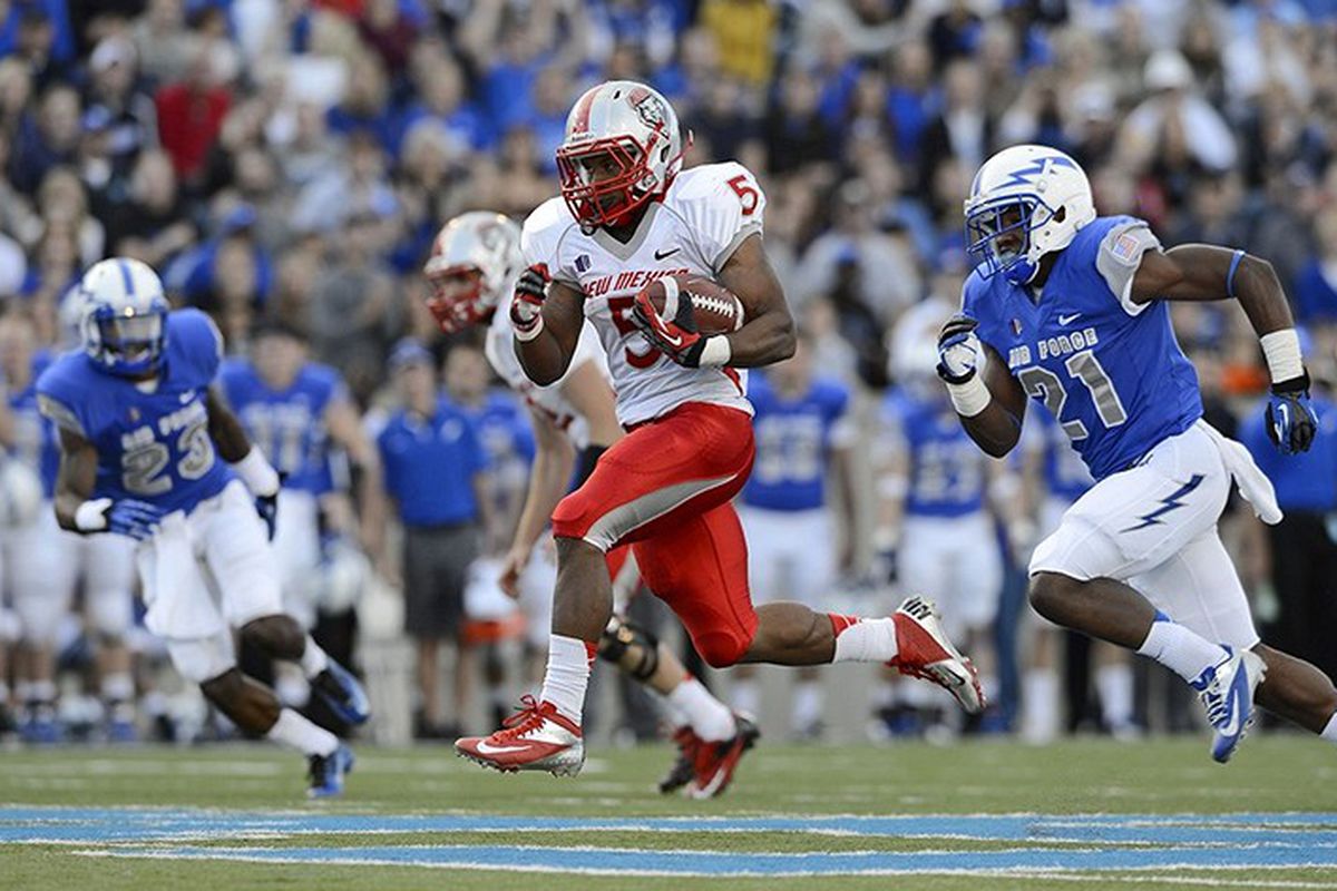 New Mexico's Kasey Carrier on a long run against Air Force during Saturday's UNM-AFA game at the U.S. Air Force Academy.
