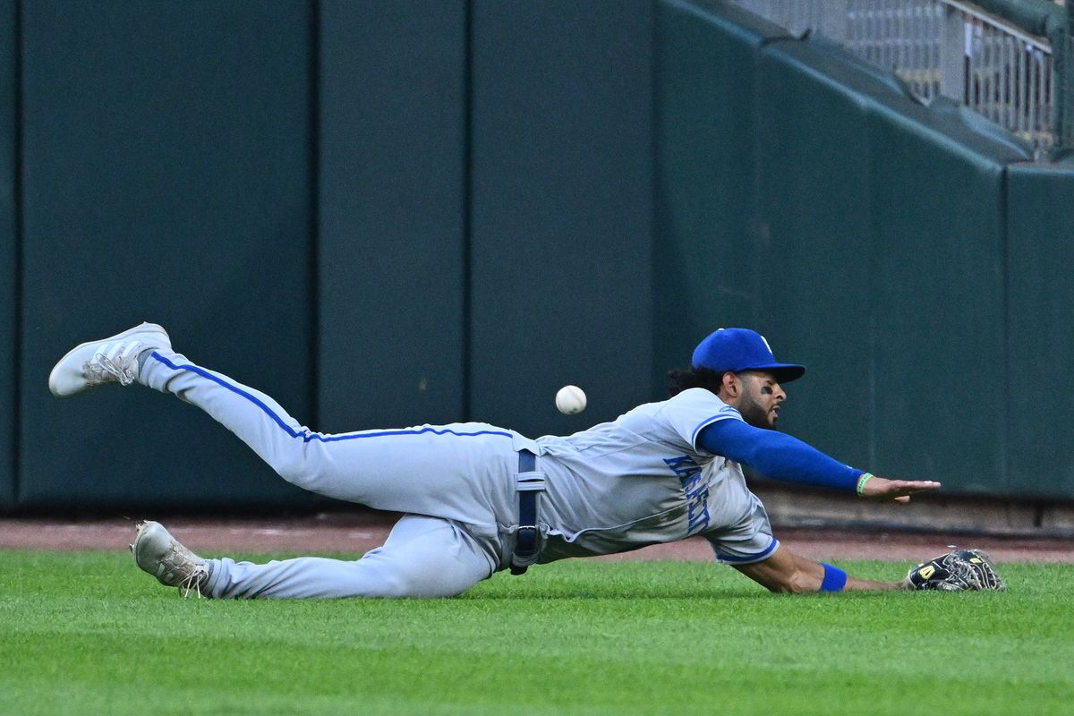 MJ Melendez #1 of the Kansas City Royals is unable to make the catch after diving for a ball hit by Andrew Vaughn #25 of the Chicago White Sox for a triple in the first inning at Guaranteed Rate Field on August 2, 2022 in Chicago, Illinois.