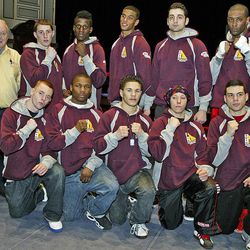 In this Feb. 17, 2010, photo, Tamerlan Tsarnaev, fifth from left, top row, accepts the trophy poses with his team at 2010 New England Golden Gloves Championship in Lowell, Mass. Tsarnaev, 26, who had been known to the FBI as Suspect No. 1 in the Boston Marathon Explosions and was seen in surveillance footage in a black baseball cap, was killed overnight on Friday, April 19, 2013, officials said. 