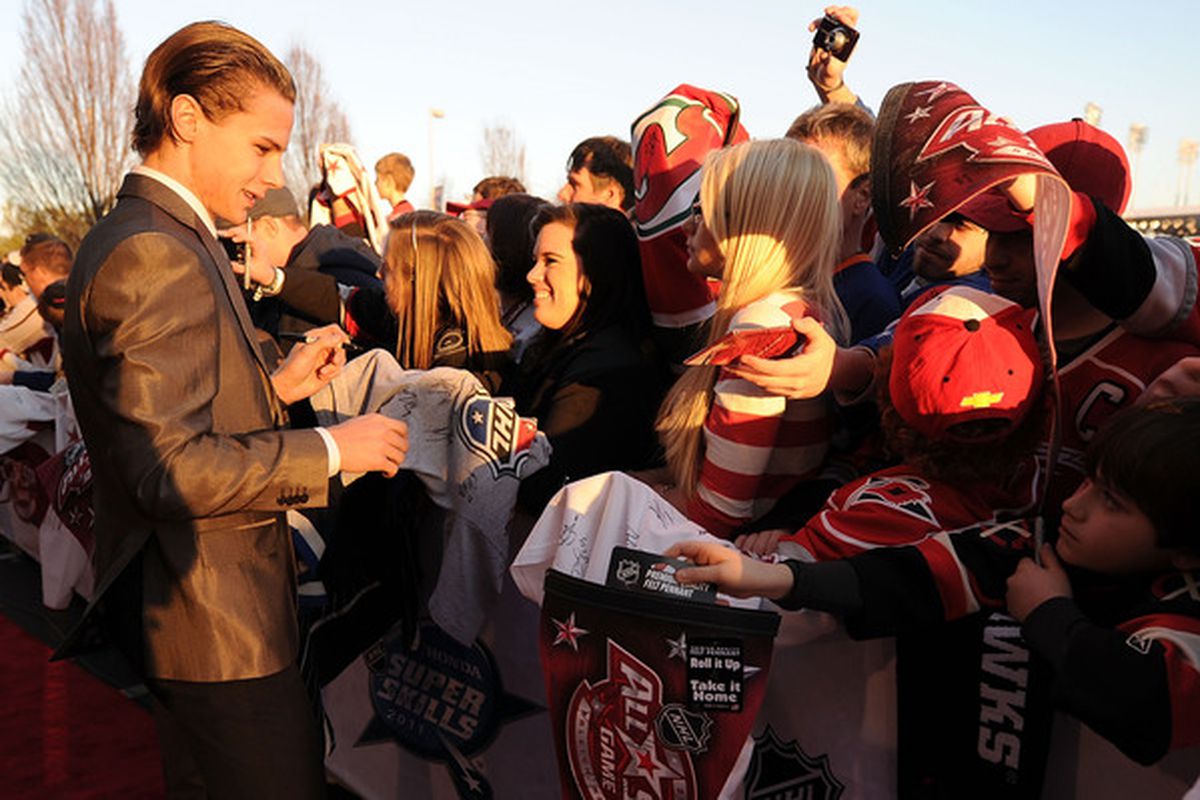 RALEIGH NC - JANUARY 29:  Erik Karlsson of the Ottawa Senators and Team Staal arrives at the NHL All-Star red carpet part of 2011 NHL All-Star Weekend on January 29 2011 in Raleigh North Carolina.  (Photo by Harry How/Getty Images)