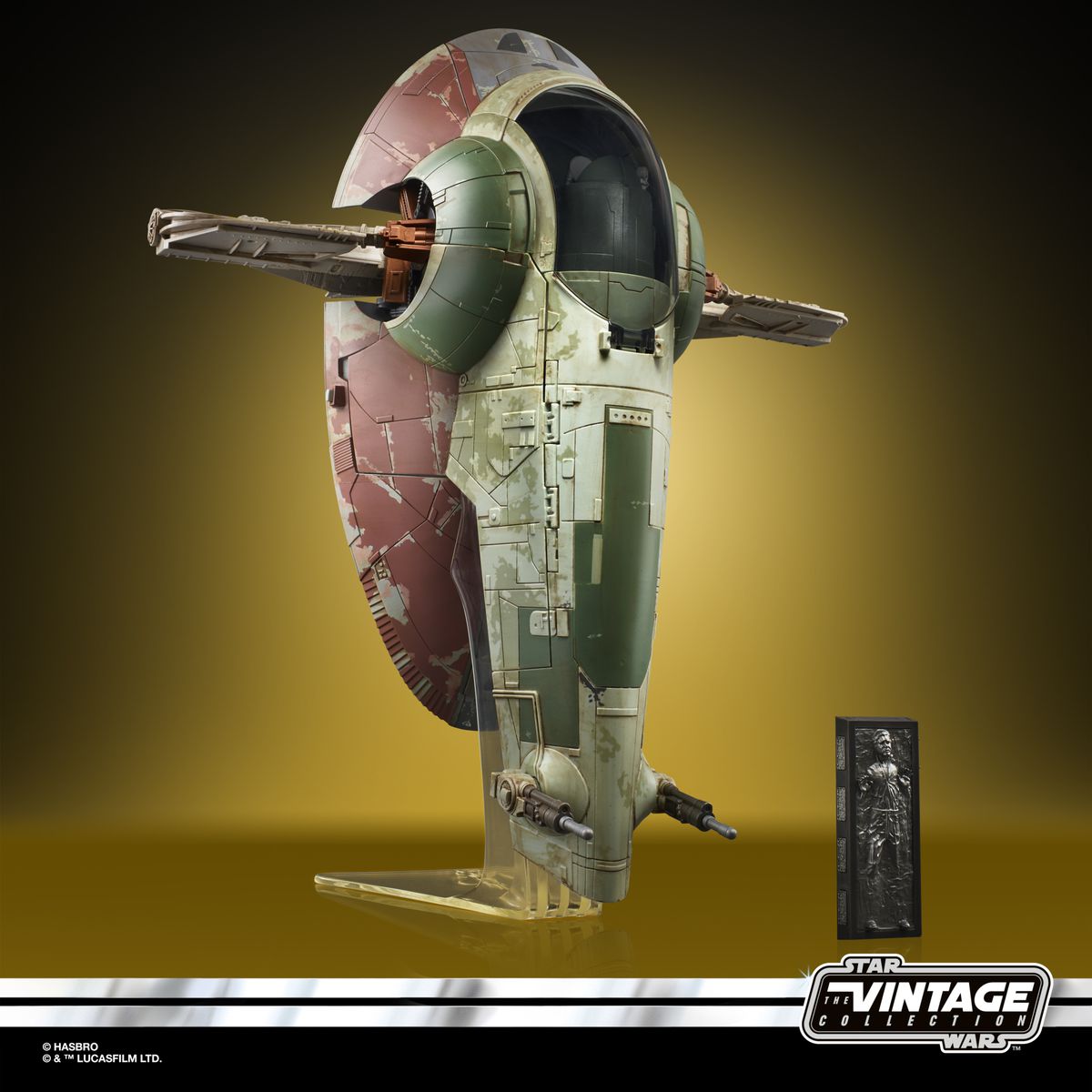 The Vintage Collection’s Slave I replica on a stand with Han in carbonite model next to it