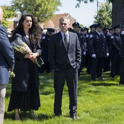 Miranda Rae Mayo (center) and David Eigenberg (right), stars of NBC’s “Chicago Fire” attend the funeral for Juan Bucio at St. Rita of Cascia High School, Monday, June 4, 2018. Bucio, a CFD diver, died on Memorial Day while conducting a search in the Chicago River. | Ashlee Rezin/Sun-Times