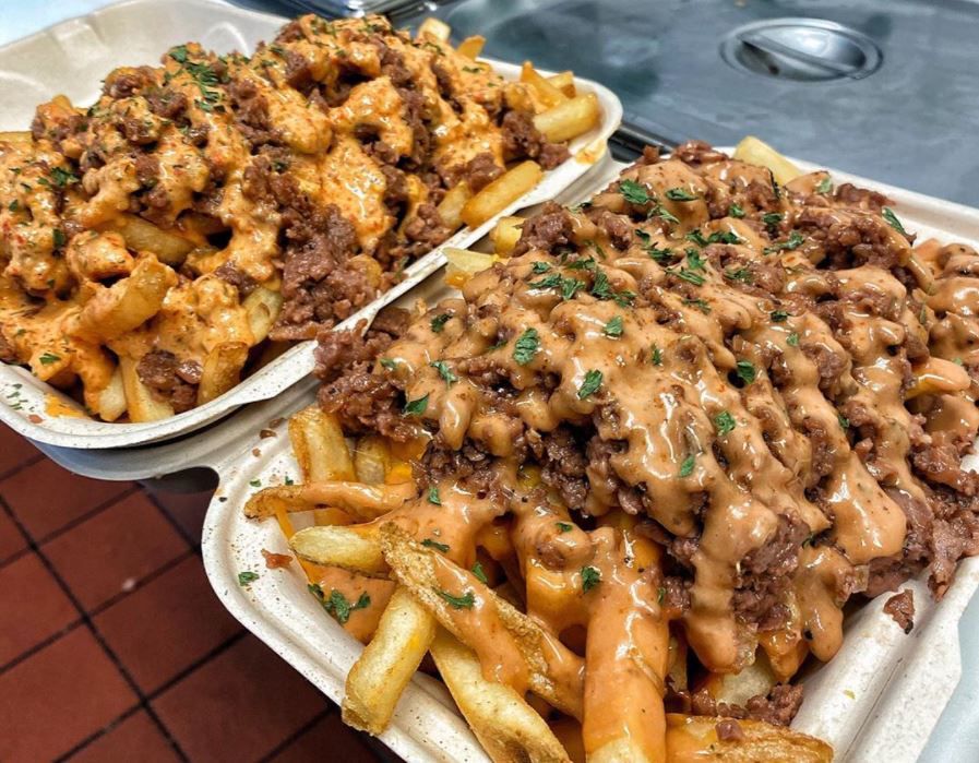 French fries loaded with cheese, and faux meat.