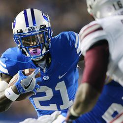 Brigham Young Cougars running back Jamaal Williams (21) looks for an opening as BYU and Mississippi State play in Provo at LaVell Edwards Stadium on Friday, Oct. 14, 2016.