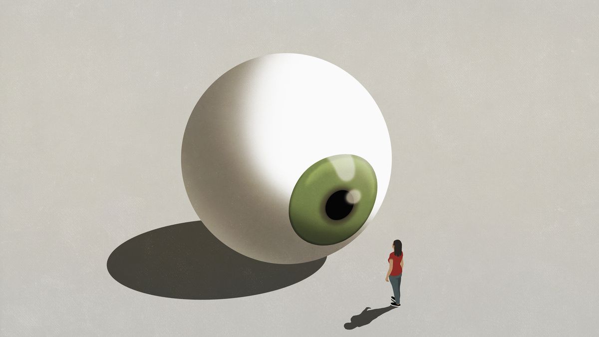 A cartoon of a tiny person staring at a giant eyeball that is staring back.
