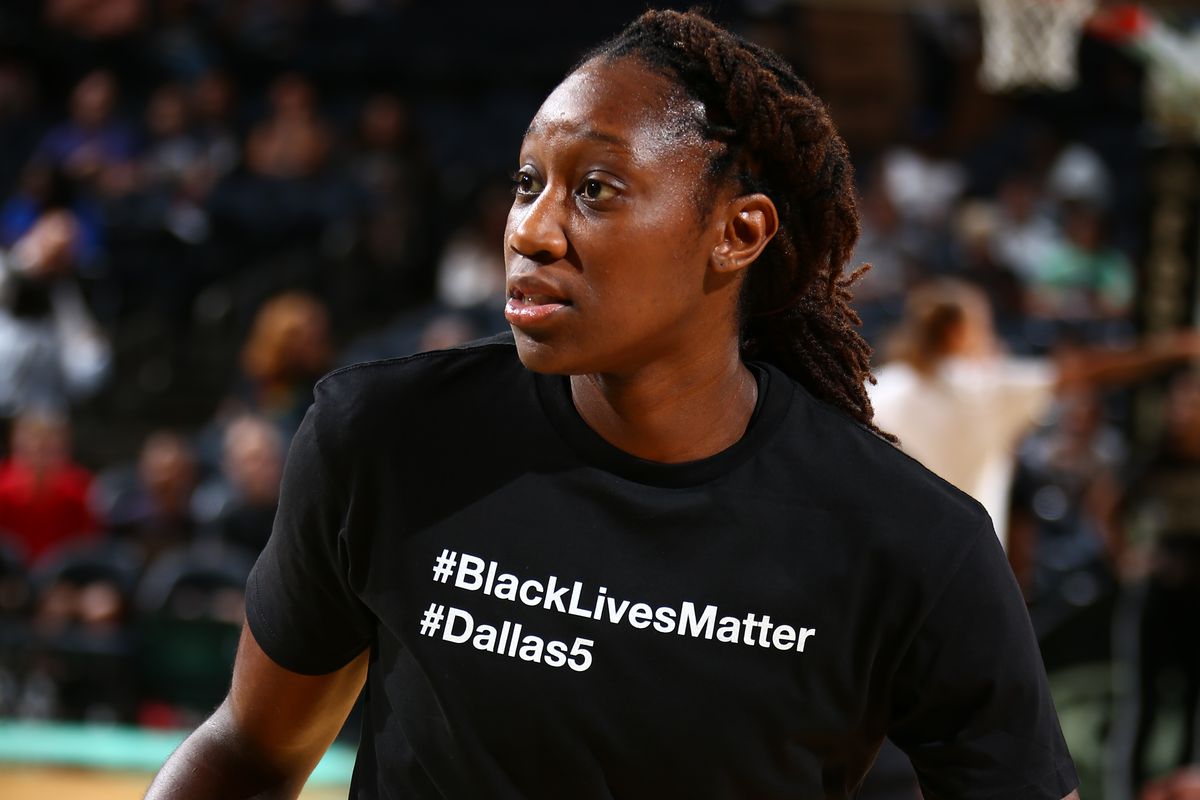 The New York Liberty's Tina Charles wears a Black Lives Matter t-shirt during pre-game warm ups.