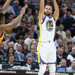 Golden State Warriors guard Stephen Curry (30) shoots during the game against the Utah Jazz at Vivint Arena in Salt Lake City on Tuesday, Jan. 30, 2018.