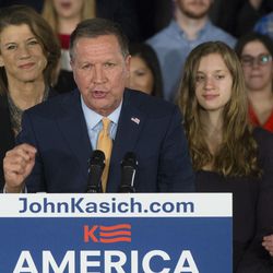 Republican presidential candidate, Ohio Gov. John Kasich speaks alongside his wife Karen, left, and daughters Emma, center right, and Reese, right,  during a watch party at the Renaissance Columbus Downtown Hotel, Tuesday, March 8, 2016, in Columbus, Ohio. (AP Photo/John Minchillo)