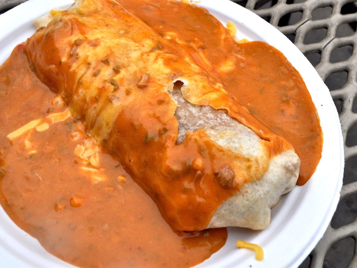 Burger-stuffed burrito smothered in green chile