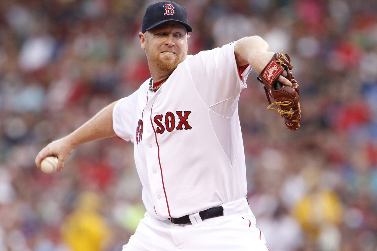 Boston, MA, USA; Boston Red Sox starting pitcher Aaron Cook (35) throws a pitch against the Texas Rangers during the first inning at Fenway Park. Mandatory Credit: David Butler II-US PRESSWIRE