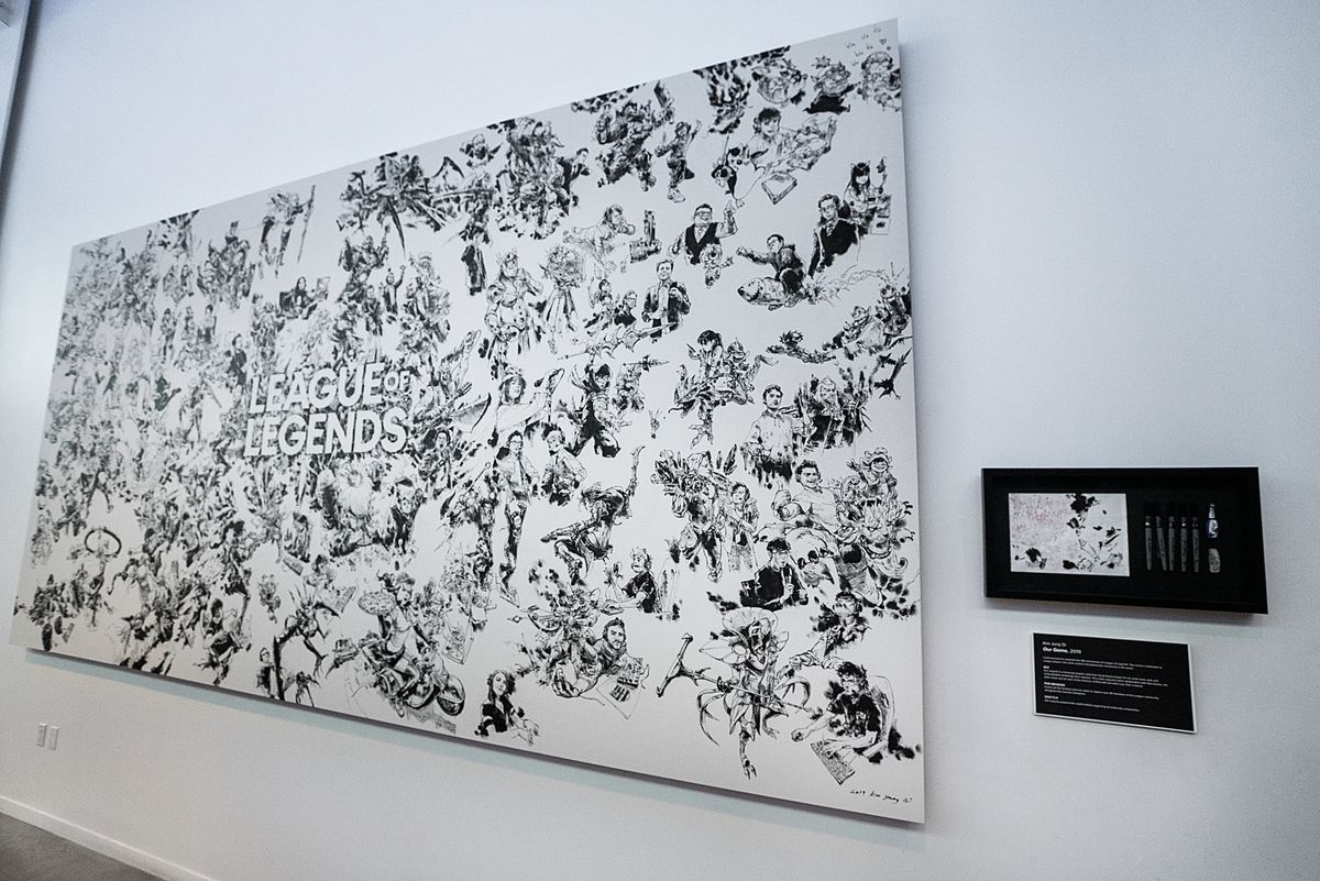 A League of Legends poster sits on a wall at Riot’s offices
