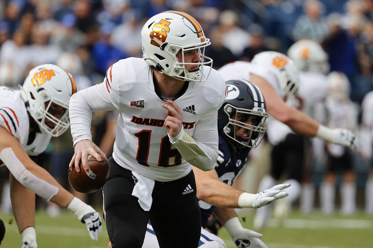 Idaho State Bengals quarterback Sagan Gronauer (16) scrambles in the first quarter against the Brigham Young Cougars at LaVell Edwards Stadium.&nbsp;