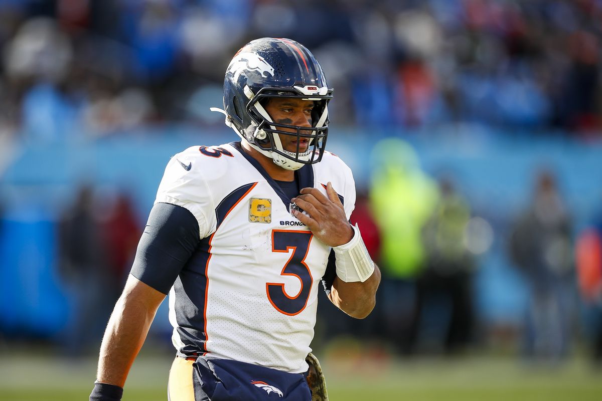 Quarterback Russell Wilson #3 of the Denver Broncos walks off the field after a third down against the Tennessee Titans at Nissan Stadium on November 13, 2022 in Nashville, Tennessee.