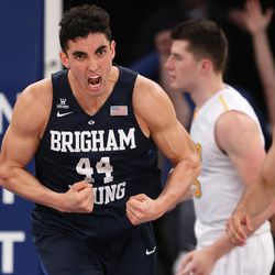 Brigham Young Cougars center Corbin Kaufusi (44) reacts after battling for a rebound and a shot as BYU and Valparaiso play in NIT semifinal action at Madison Square Garden in New York City. BYU loses 70-72 Tuesday, March 29, 2016.