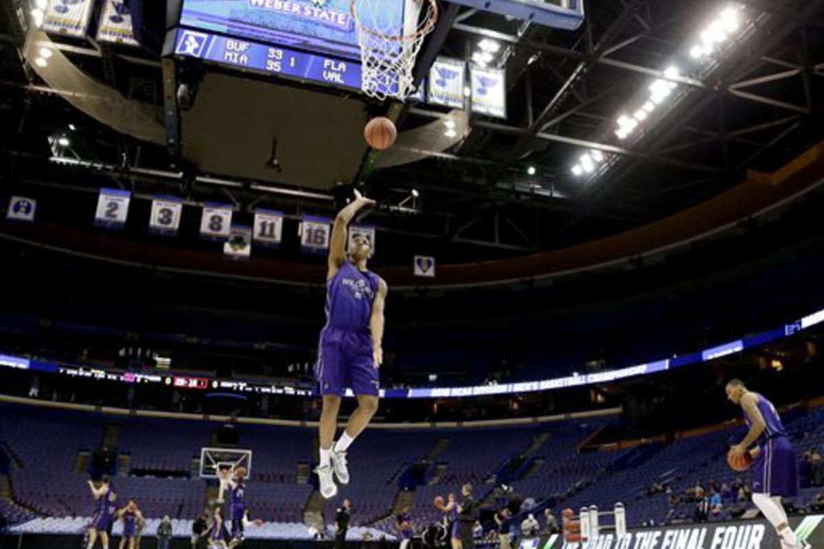 Weber State's Kyndahl Hill shoots during practice ahead of a first-round men's college basketball game in the NCAA Tournament, Thursday, March 17, 2016, in St. Louis. Weber State plays Xavier on Friday. (AP Photo/Charlie Riedel)