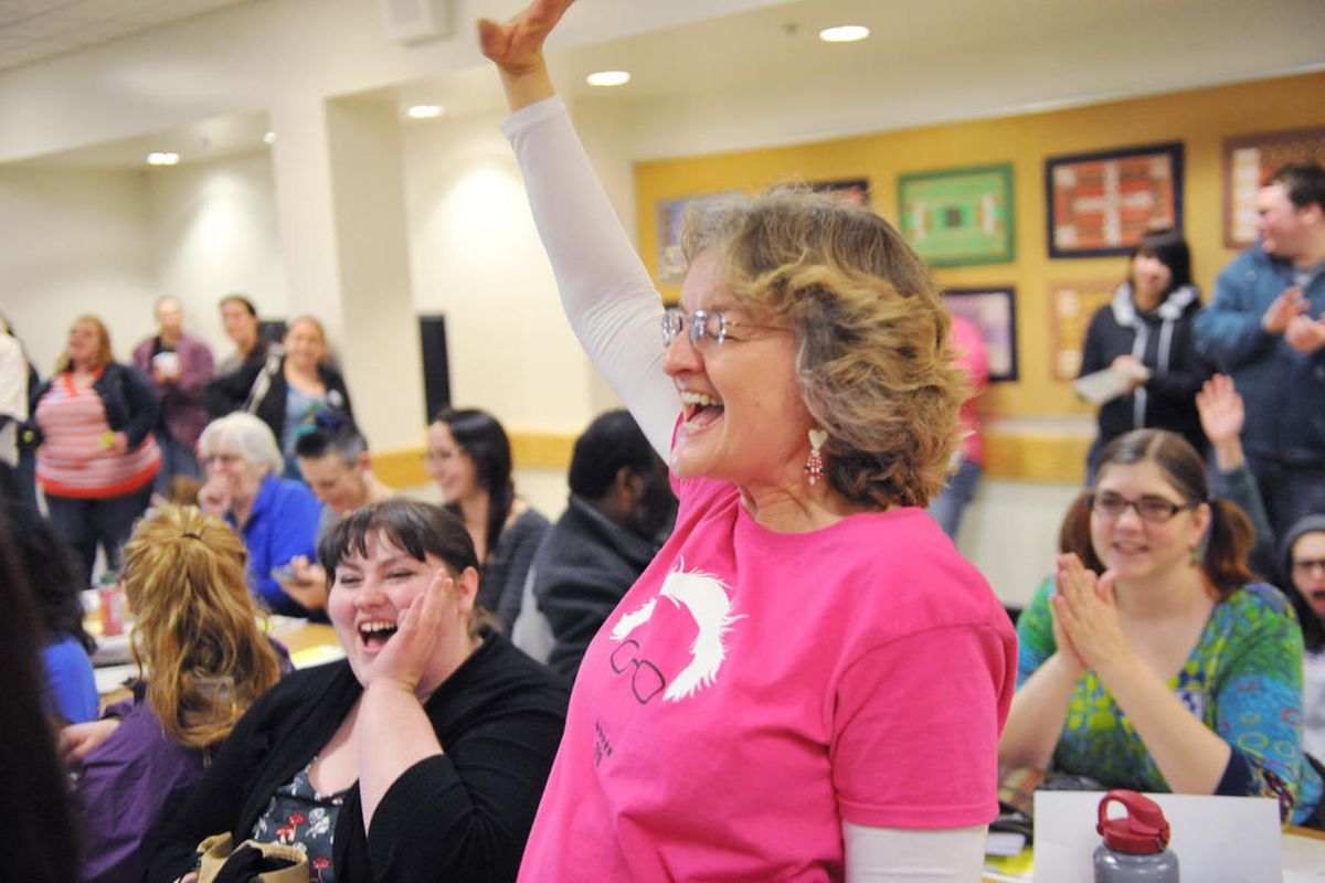 Bernie Sanders supporter Maryellen Lambert reacts at the Democratic party caucus in Anchorage, Alaska, Saturday, March 26, 2016. 