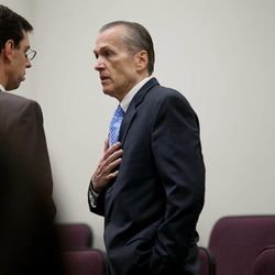Martin MacNeill speaks to his attorney Randy Spencer, left, before proceedings in Provo's 4th District Court on Tuesday, Nov. 5, 2013. MacNeill is charged with murder in the 2007 death of his wife, Michele MacNeill.