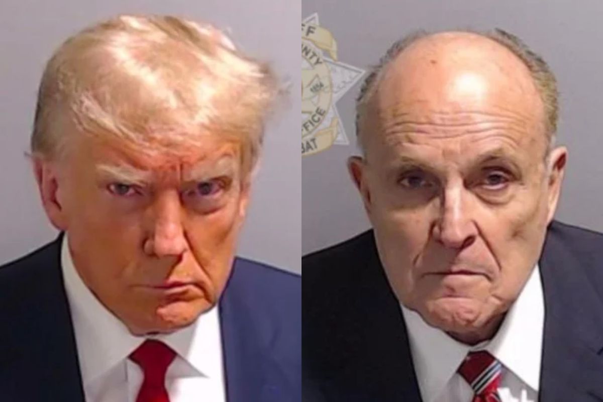 Donald Trump and Rudy Giuliani mugshots side by side.
