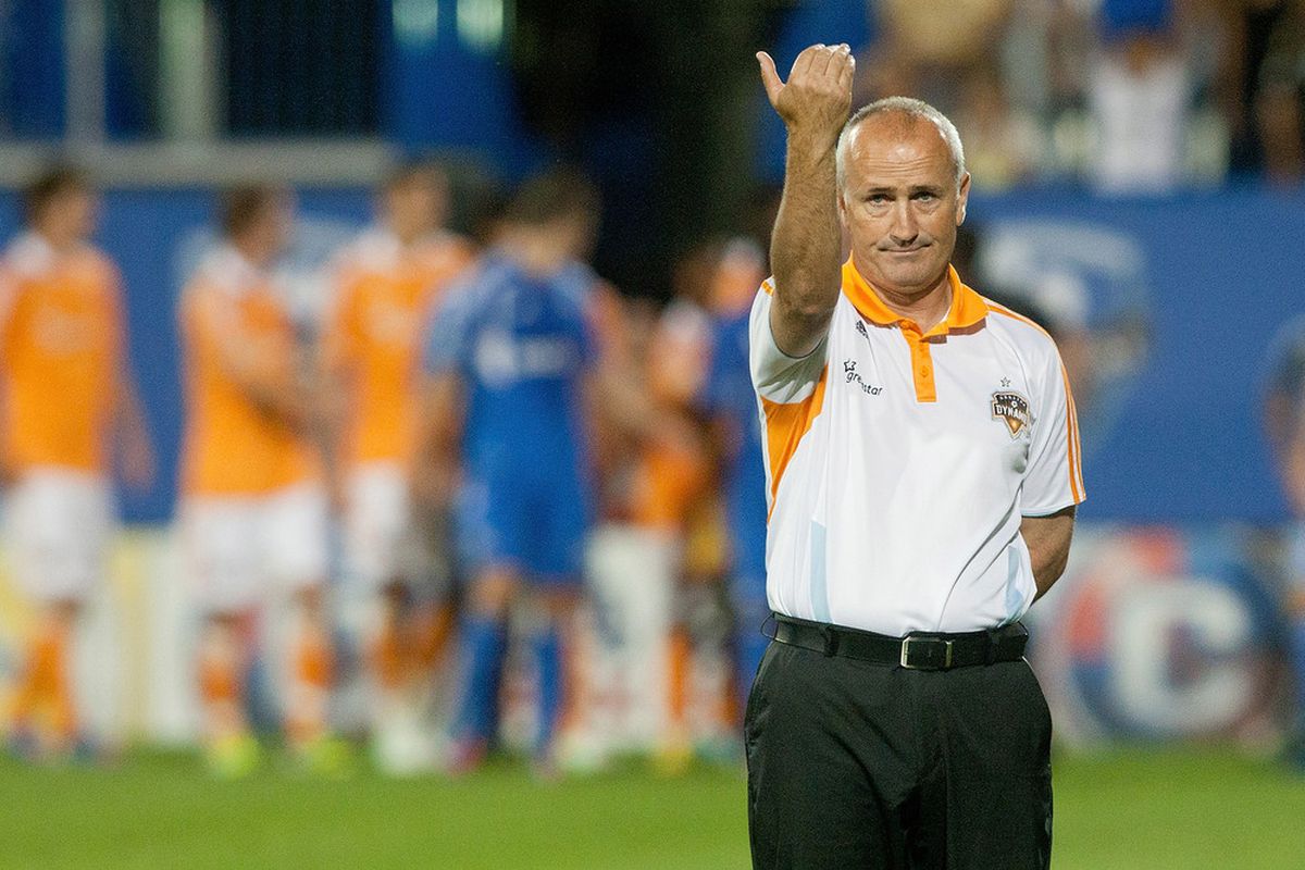 MONTREAL, CANADA - JUNE 23:  Head coach Dominic Kinnear of the Houston Dynamo calls up players during the MLS match against the Montreal Impact at Saputo Stadium on June 23 2012 in Montreal, Quebec, Canada. (Photo by Francois Laplante/Getty Images)