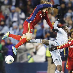 Real's Ned Grabavoy and Kansas City's C.J. Sapong crash into each other as they try for the ball as Real Salt Lake and Sporting KC play Saturday, Dec. 7, 2013 in MLS Cup action. Sporting KC won in a shootout.