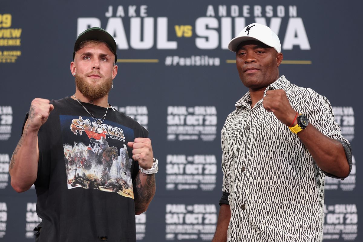 Jake Paul and Anderson Silva at a pre-fight press conference. 