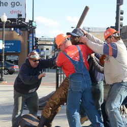 5:15 p.m. Ernie Banks statue being lifted - 