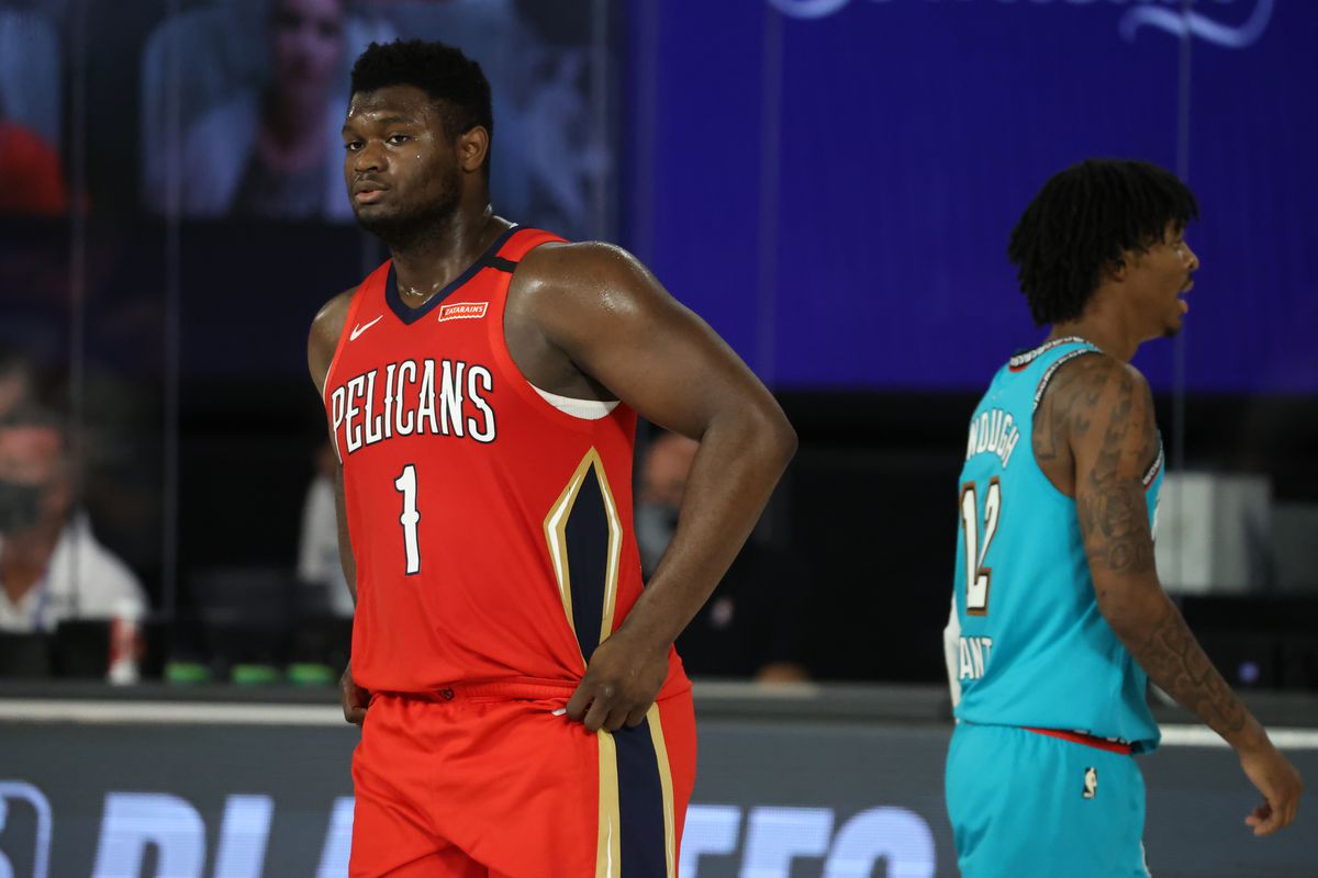 Zion Williamson of the New Orleans Pelicans and Ja Morant of the Memphis Grizzlies look on during the game on August 3, 2020 at HP Field House at ESPN Wide World of Sports in Orlando, Florida.&nbsp;