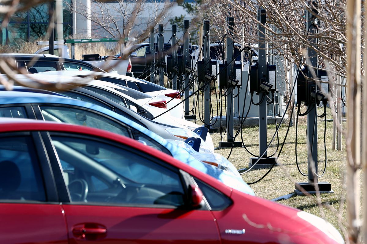 Electric cars are parked at charging stations as Packsize International in Salt Lake City becomes the largest electric vehicle charger installation in Utah on Tuesday, Dec. 19, 2017.